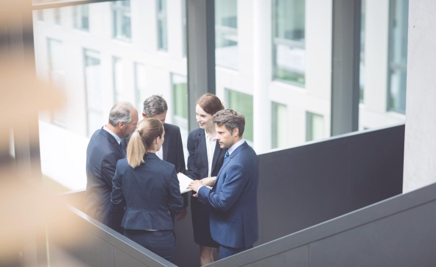 Entrepreneur learning budget planning techniques with financial advisor